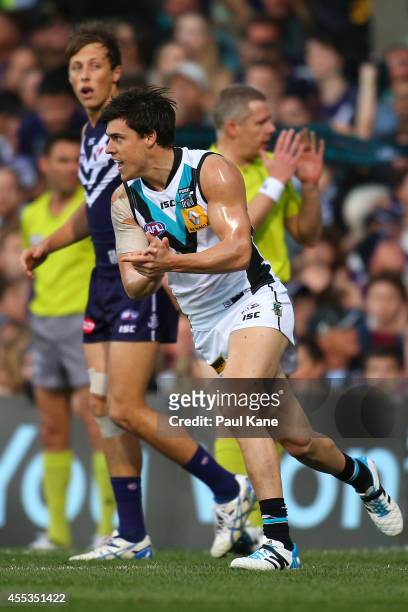 Angus Monfries of the Power celebrates after kicking a goal during the AFL 1st Semi Final match between the Fremantle Dockers and the Port Adelaide...