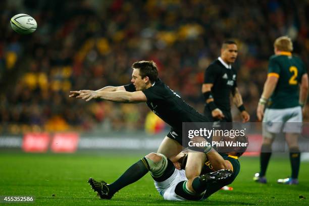 Ben Smith of the All Blacks is tackled by Duane Vermeulen of the Springboks during The Rugby Championship match between the New Zealand All Blacks...