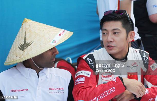 Mahindra Racing Formula E Team driver Karun Chandhok and China Racing team driver Ho-Pin Tung attend a fan meeting during the 2014/2015 FIA Formula E...