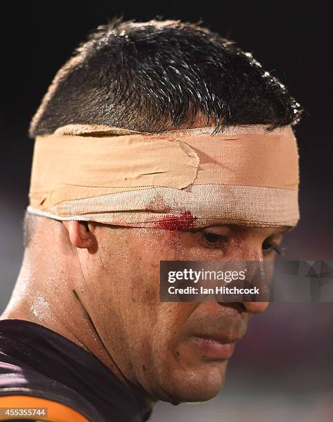 Justin Hodges of the Broncos looks dejected after losing the NRL 1st Elimination Final match between the North Queensland Cowboys and the Brisbane...