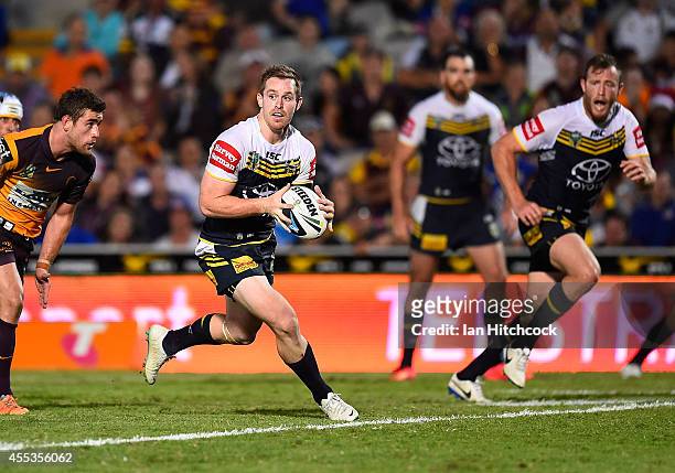 Michael Morgan of the Cowboys runs the ball during the NRL 1st Elimination Final match between the North Queensland Cowboys and the Brisbane Broncos...