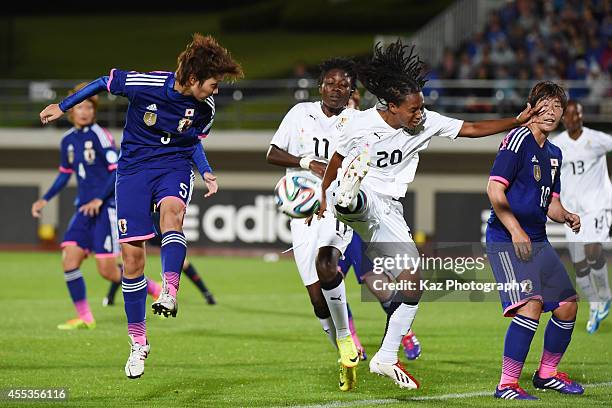 Kana Osafune of Japan wins the header over Linda Eshun of Ghana during the women's international friendly match between Japan and Ghana at ND Soft...