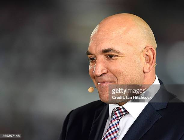 Television commentator Gordon Tallis looks on before the start of the NRL 1st Elimination Final match between the North Queensland Cowboys and the...