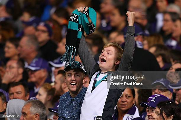 Power fans celebrate a goal during the AFL 1st Semi Final match between the Fremantle Dockers and the Port Adelaide Power at Patersons Stadium on...