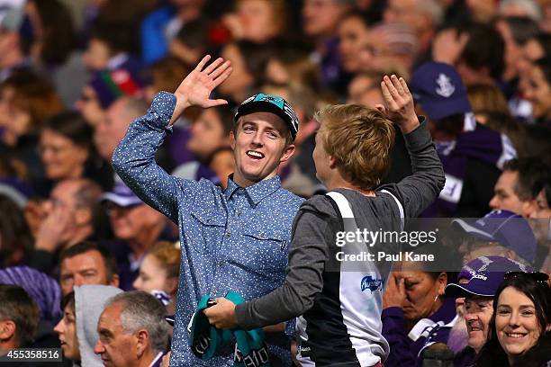 Power fans celebrate a goal during the AFL 1st Semi Final match between the Fremantle Dockers and the Port Adelaide Power at Patersons Stadium on...