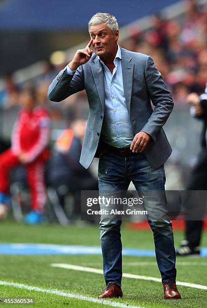 Head coach Armin Veh of Stuttgart reacts during the Bundesliga match between FC Bayern Muenchen and VfB Stuttgart at Allianz Arena on September 13,...