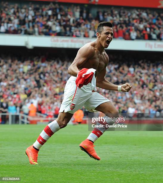 Alexis Sanchez celebrates scoring Arsenal's 2nd goal during the Barclays Premier League match between Arsenal and Manchester City at Emirates Stadium...