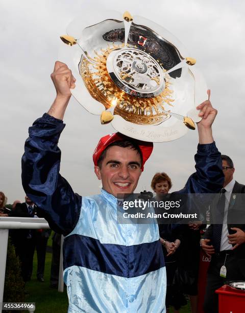 Andrea Atzeni after riding Kingston Hill to win The Ladbrokes St Leger Stakes at Doncaster racecourse on September 13, 2014 in Doncaster, England.
