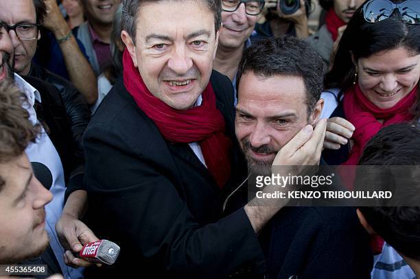 Former French far-left leader Jean-Luc Melenchon greets French rogue trader of the Societe Generale bank, Jerome Kerviel on September 13, 2014 during...