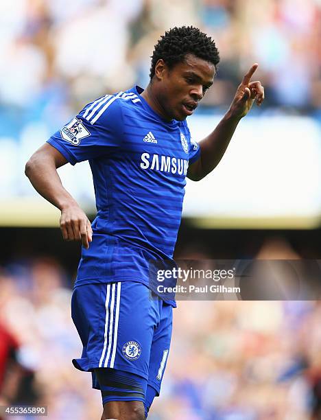 Loic Remy of Chelsea celebrates as he scores their fourth goal during the Barclays Premier League match between Chelsea and Swansea City at Stamford...