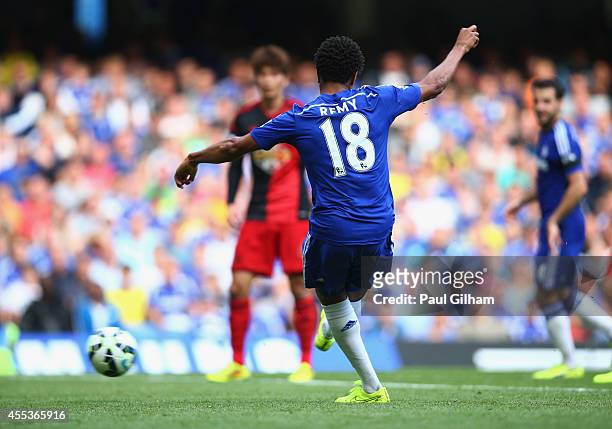 Loic Remy of Chelsea scores their fourth goal during the Barclays Premier League match between Chelsea and Swansea City at Stamford Bridge on...