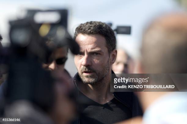 French rogue trader of the Societe Generale bank, Jerome Kerviel attends on September 13, 2014 the Festival of Humanity , a political event and music...