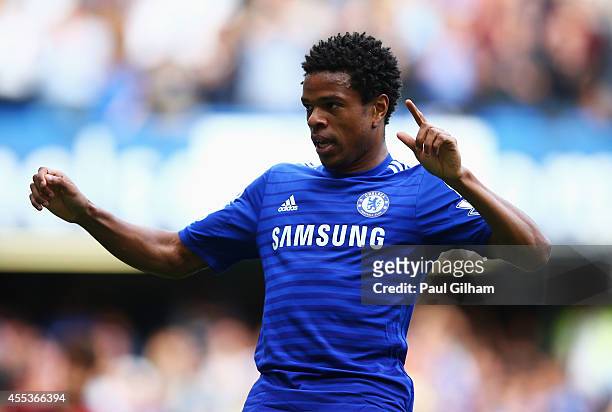 Loic Remy of Chelsea celebrates as he scores their fourth goal during the Barclays Premier League match between Chelsea and Swansea City at Stamford...