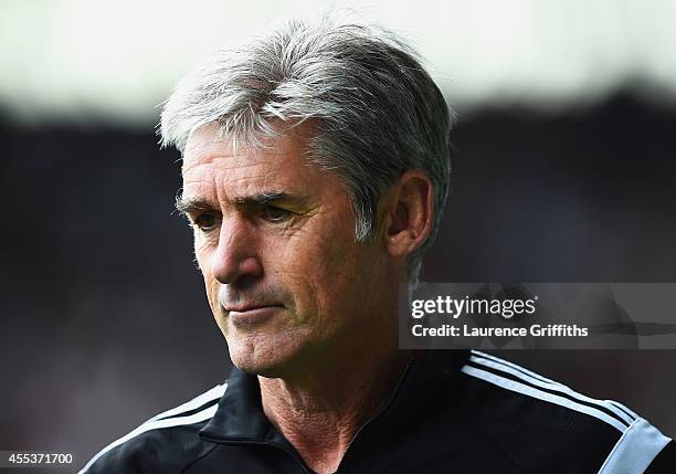 Alan Irvine, manager of West Brom looks on during the Barclays Premier League match between West Bromwich Albion and Everton at The Hawthorns on...