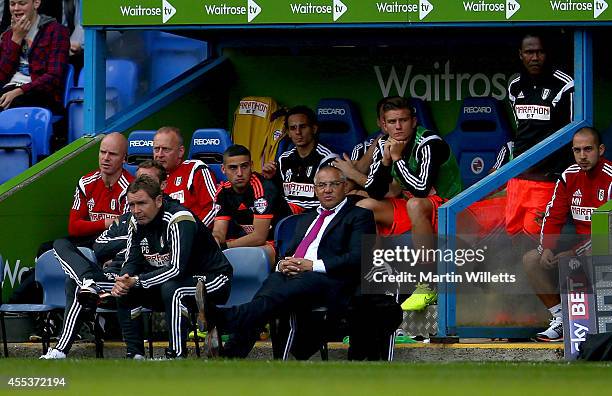 Felix Magath manager of Fulham and the rest of the Fulham bench look on dejected during the Sky Bet Championship match between Reading and Fulham at...