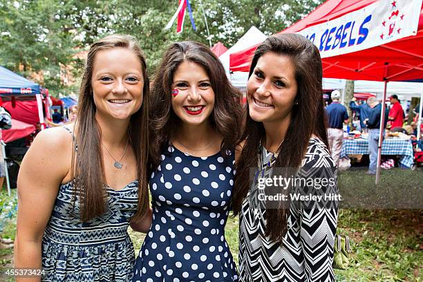 Softball players Emily Boyd, Natalie Martinez and Miranda Strother of the Ole Miss Rebels softball team, enjoy the The Grove before a game against...