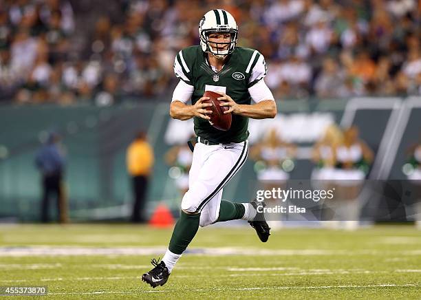 Quarterback Matt Simms of the New York Jets against the Indianapolis Colts during a preseason game at MetLife Stadium on August 7, 2014 in East...