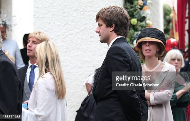 Prince Christian von Hannover and his brother Ernst August von Hannover jr. Attends the wedding of Maria Theresia Princess von Thurn und Taxis and...