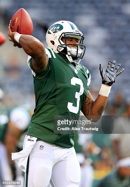 Quarterback Tajh Boyd of the New York Jets warms up prior to a preseason game against the Indianapolis Colts at MetLife Stadium on August 7, 2014 in...