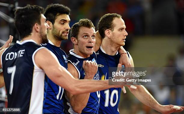 Argentinian team after winning a point, Rodrigo Quiroga , Jose Luis Gonzalez , during the FIVB World Championships match between Argentina and Italy...