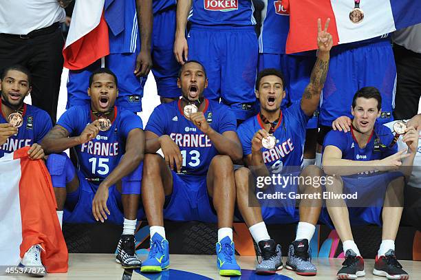 Boris Diaw and teammates of the France National Team celebrates after defeating the Lithuania National Team in the 2014 FIBA World Cup Third Place...