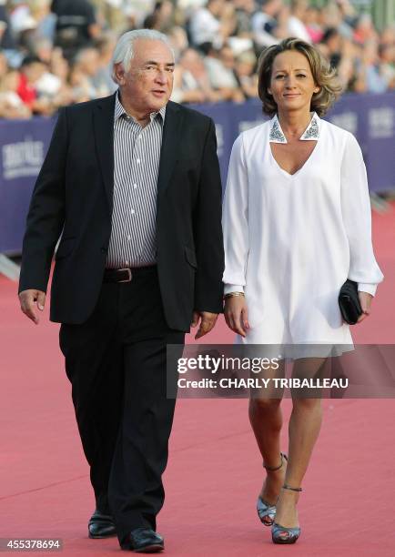 Former IMF chief Dominique Strauss-Kahn and his partner Media Marketing Executive Myriam L'Aouffir arrive to attend the closing ceremony of the 40th...