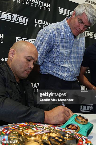 Boxer Jesse James Leija sings autographs during the Box Fan Expo at the Las Vegas Convention Center on September 13, 2014 in Las Vegas, Nevada.