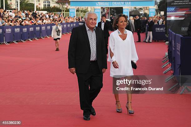 Dominique Strauss-Kahn and Myriam L'Aoufir arrive at the closing ceremony and the 'Sin City : A Dame To Kill For' premiere of during the 40th...