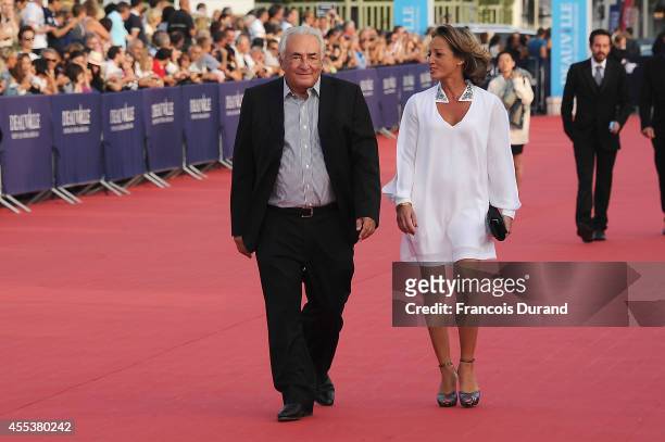 Dominique Strauss-Kahn and Myriam L'Aoufir arrive at the closing ceremony and the 'Sin City : A Dame To Kill For' premiere of during the 40th...