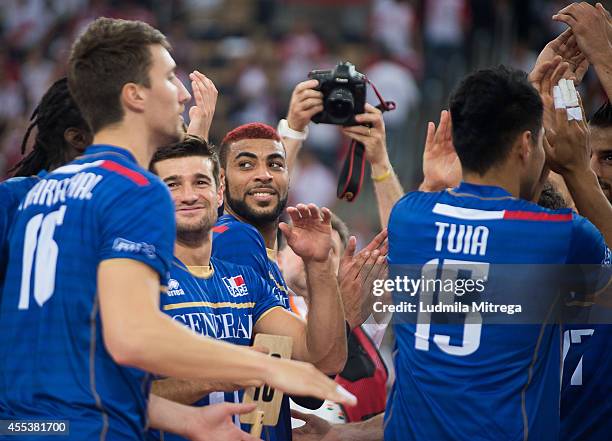 France team celebrate after winning the match during the FIVB World Championships match between Serbia and France on September 13, 2014 in Lodz,...
