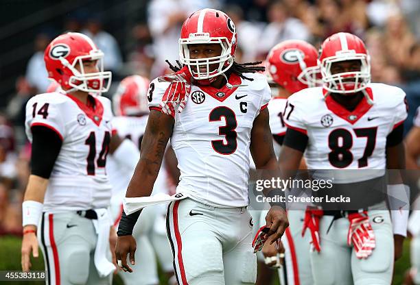 Todd Gurley of the Georgia Bulldogs runs onto the field after a weather delay before their game against the South Carolina Gamecocks at...