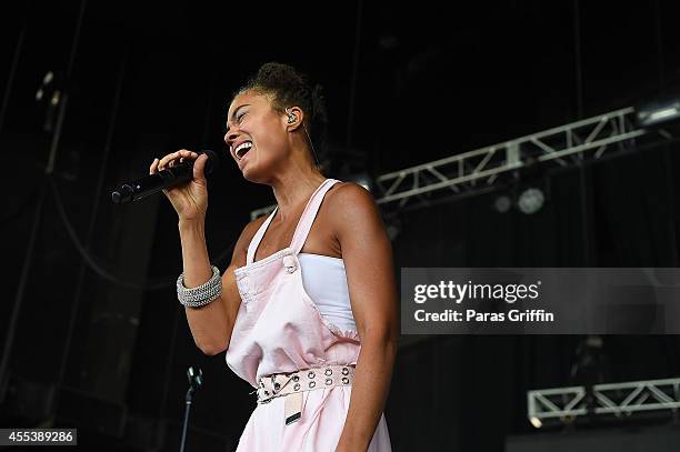 Recording artist Amel Larrieux performs during 2014 ONE Musicfest at Aaron's Amphitheater at Lakewood on September 13, 2014 in Atlanta, Georgia.