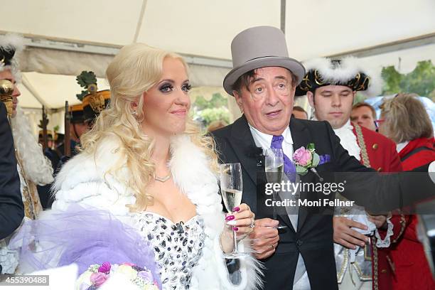 Richard Lugner and Cathy Schmitz celebrate their wedding at Liechtenstein Palace on September 13, 2014 in Vienna, Austria.