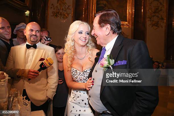 Richard Lugner and Cathy Schmitz celebrate their wedding at Liechtenstein Palace on September 13, 2014 in Vienna, Austria.