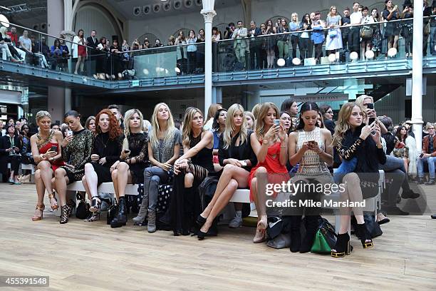 Mary Charteris, Abbey Clancy, Laura Whitmore, Millie Mackintosh and Leah Weller attend the Julien Macdonald show during London Fashion Week Spring...