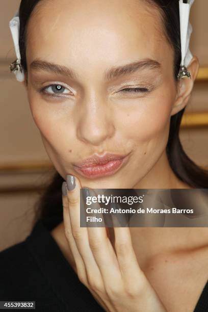 Model poses backstage at the Julien Macdonald show during London Fashion Week Spring Summer 2015 at on September 13, 2014 in London, England.