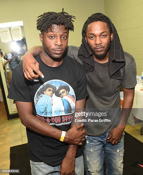 Elgetty Rapper Rapper Isaiah Rashad and rapper Kendrick Lamar backstage at the 2014 ...