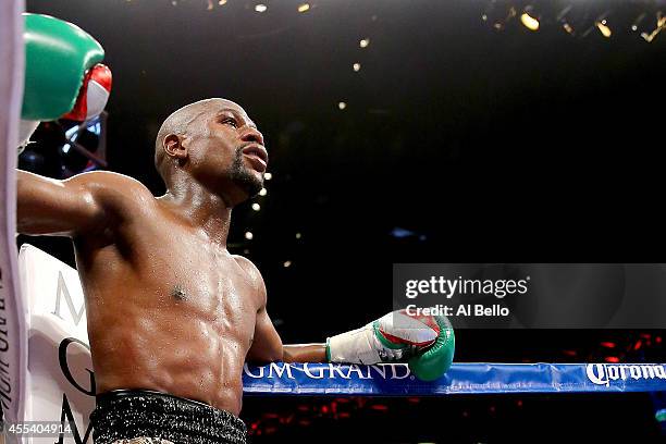 Floyd Mayweather Jr. Looks on while taking on Marcos Maidana during their WBC/WBA welterweight title fight at the MGM Grand Garden Arena on September...