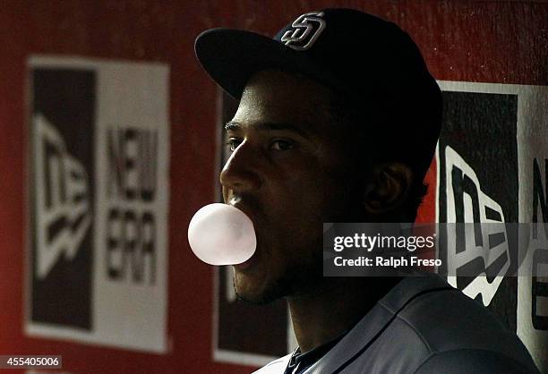Rymer Liriano of the San Diego Padres blows a bubble in the dugout during the seventh inning of a MLB game against the Arizona Diamondbacks at Chase...