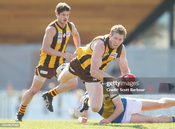 Ben McEvoy of the Hawks is tackled during the VFL Preliminary Final match between the Box Hill Hawks and Williamstown at North Port Oval on September...