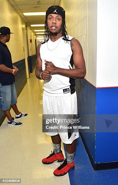 Trinidad James attends the LUDA vs YMCMB celebrity basketball game at Georgia State University Sports Arena on August 31, 2014 in Atlanta City.