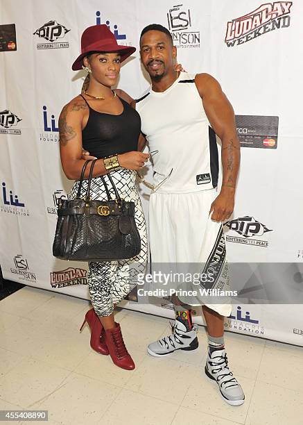 Joseline Hernandez and Stevie J attends the LUDA vs YMCMB celebrity basketball game at Georgia State University Sports Arena on August 31, 2014 in...