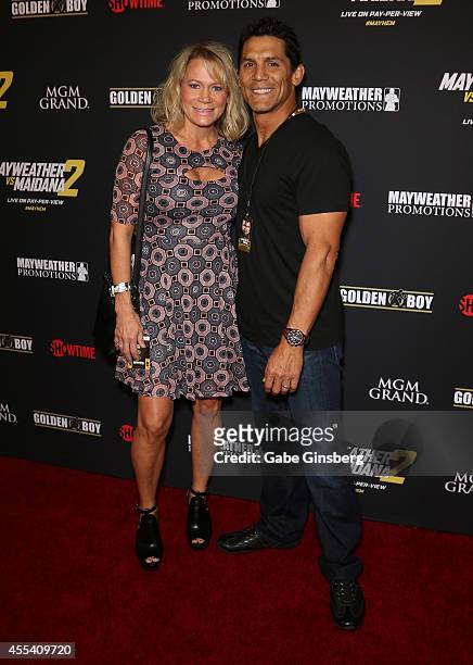 Amy Shamrock and her husband, former mixed martial arts fighter Frank Shamrock arrive at Showtime's VIP prefight party for "Mahem: Mayweather vs....