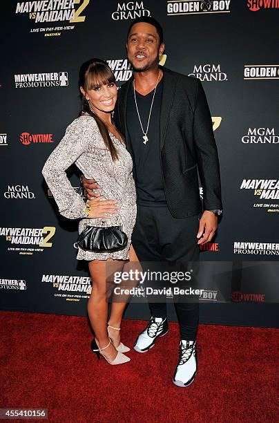 Actor Pooch Hall and his wife, Linda Hall, arrive at Showtime's VIP prefight party for "Mayhem: Mayweather vs. Maidana 2" at the MGM Grand Garden...