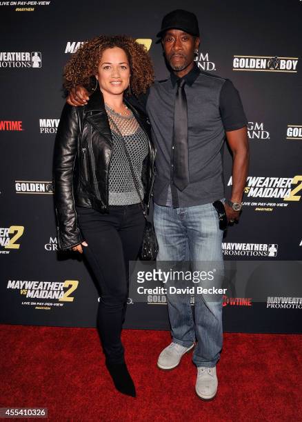 Actors Bridgid Coulter and Don Cheadle arrive at Showtime's VIP prefight party for "Mayhem: Mayweather vs. Maidana 2" at the MGM Grand Garden Arena...
