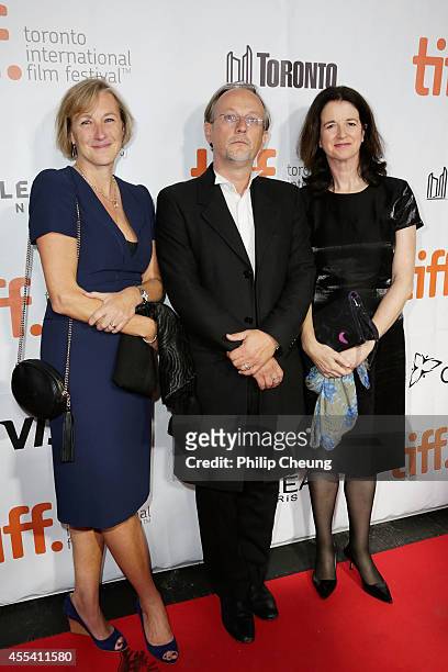 Producers Gail Egan, Bertrand Faivre and Andrea Calderwood attend the "A Little Chaos" premiere during the 2014 Toronto International Film Festival...