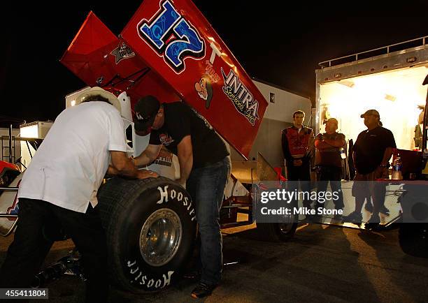 Bruce Griffith and Shane Trowbridge work on the ASCS sprint car of Channin Tankersley during the Port-A-Cool U.S. National Dirt Track Championship at...