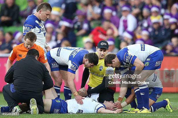 Pat O'Hanlon of the Bulldiogs is consoled by teamates after an injury of the Bulldogs during the NRL 2nd Elimination Final match between the...