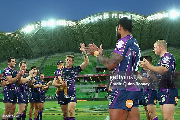 Ryan Hoffman of the Storm waves good bye to the crowd after playing his last game for the Storm during the NRL 2nd Elimination Final match between...