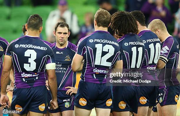 Cameron Smith of the Storm speaks to teamates after their defeat during the NRL 2nd Elimination Final match between the Melbourne Storm and the...